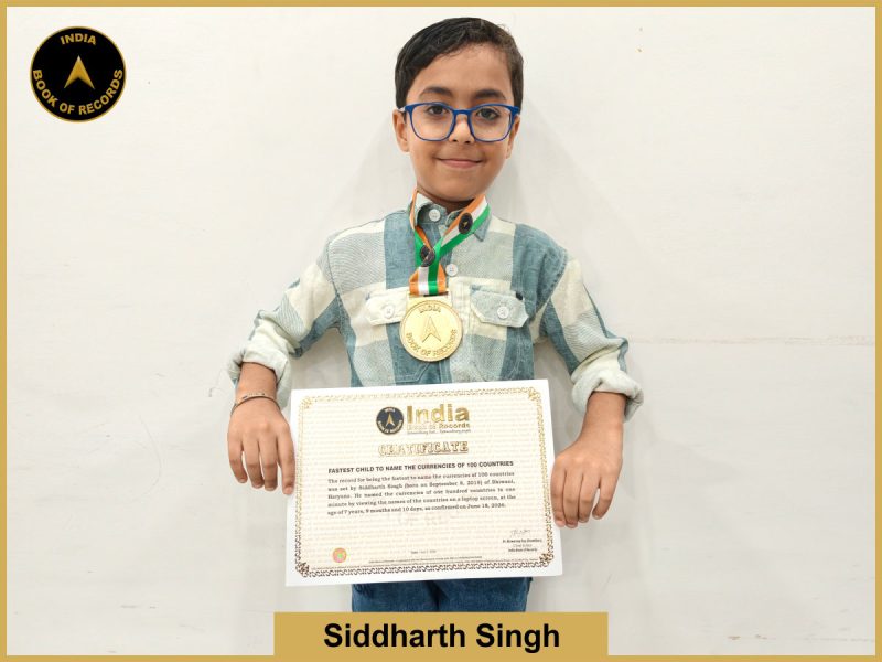 Pic of Sidharth Singh, Fastest child to name the currencies of 100 countries.