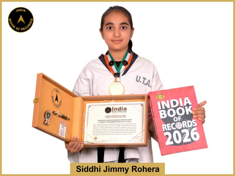 image of Maximum wooden boards broken with a single Taekwondo punch by Siddhi Jimmy Rohera.