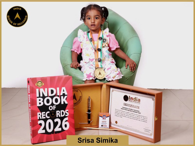 Pic of Srisa Simika, Youngest to hold the dead hang position on a monkey bar