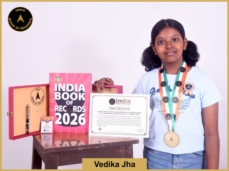 Image of Vedika Jha, Fastest child to recite characteristics of countries from A to Z and represent their flags on a 3 x 3 Rubik’s Cube.