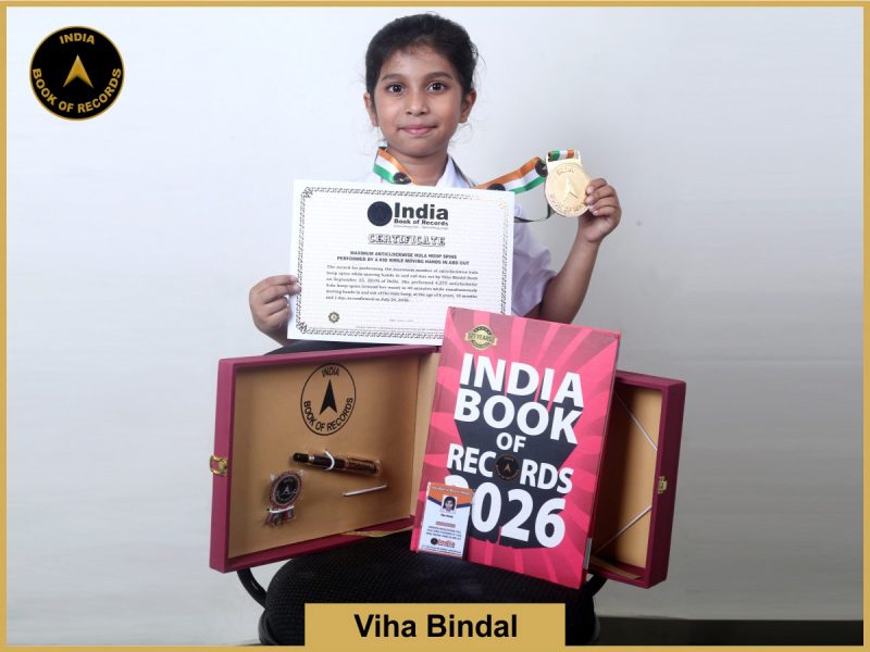 Image of Viha Bindal, Maximum anticlockwise hula hoop spins performed by a kid while moving hands in and out.